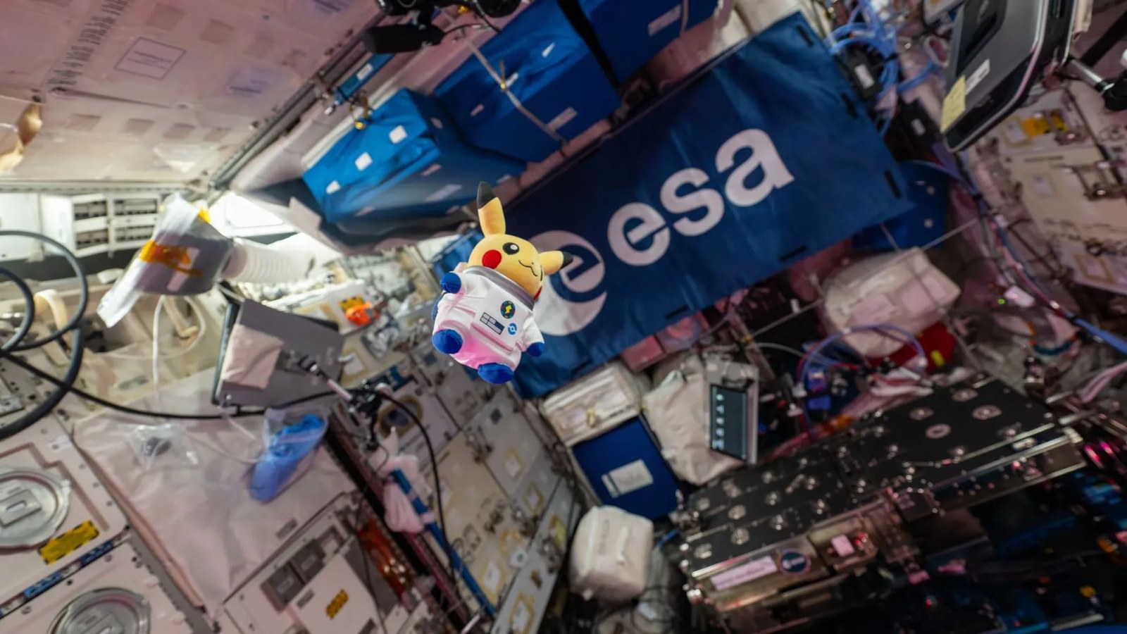 a plush pikachu floaring on the iSS